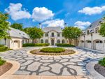 Park-like grounds, grand loggias and sprawling lawns in Old Preston Hollow