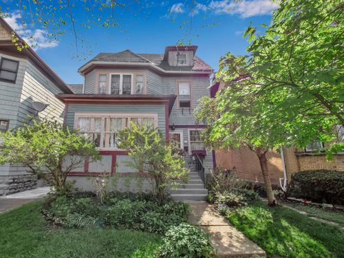 Charming, Traditional Elmwood Home!