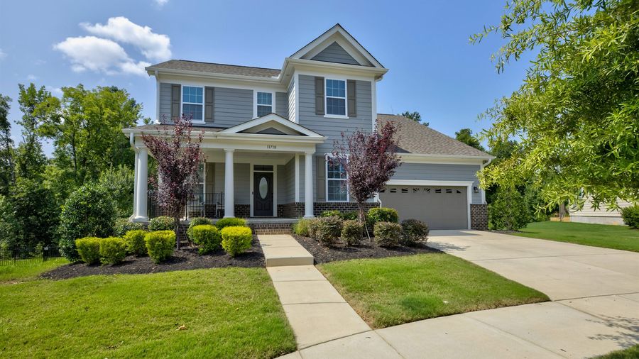 The exquisite 3story culdesac home is located in Chapel Cove